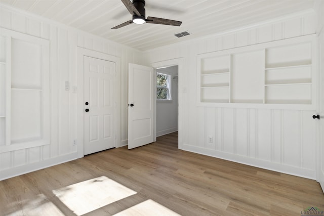 interior space featuring light hardwood / wood-style floors and ceiling fan