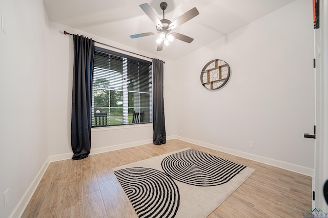 interior space featuring light wood-type flooring and ceiling fan