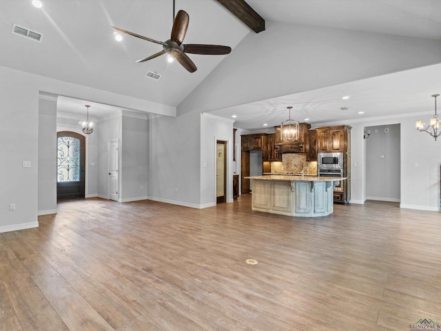 unfurnished living room with beam ceiling, ceiling fan, high vaulted ceiling, and light hardwood / wood-style floors