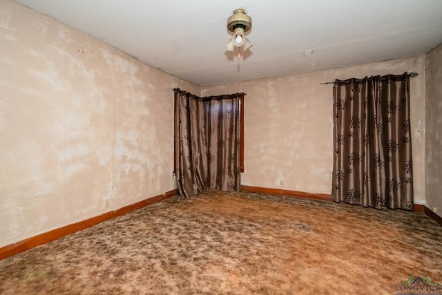 unfurnished room with carpet flooring