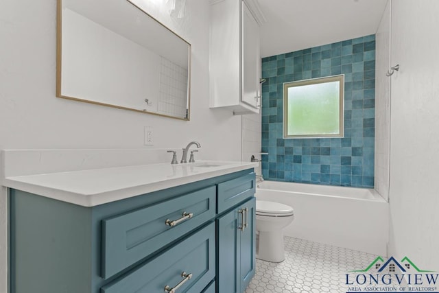 bathroom featuring vanity, toilet, and shower / washtub combination