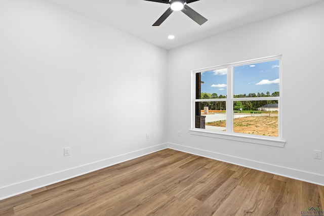 354 County Road 2204 D, Tatum, TX 75691 - bathroom with marble look tiles, baseboards, vanity, toilet, and a ceiling fan