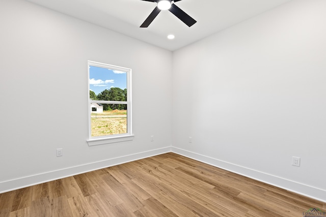 unfurnished room with a ceiling fan, baseboards, recessed lighting, and light wood finished floors