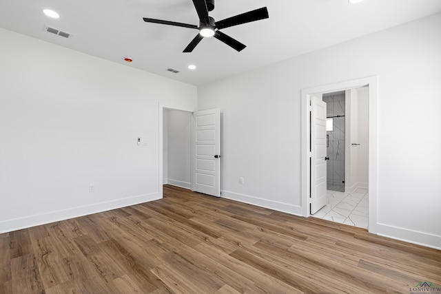 unfurnished bedroom with recessed lighting, baseboards, visible vents, and light wood-style flooring