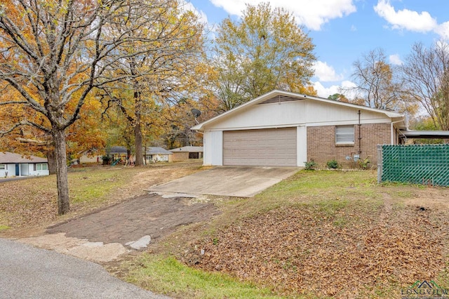 view of side of home with a garage