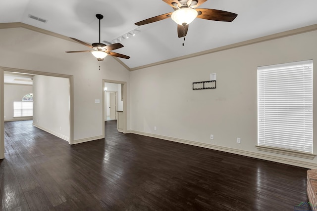 unfurnished room with lofted ceiling, dark wood-type flooring, and visible vents