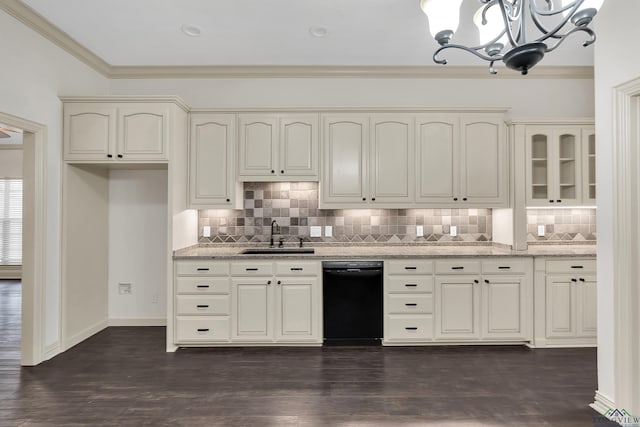 kitchen with a sink, cream cabinets, ornamental molding, and dishwasher