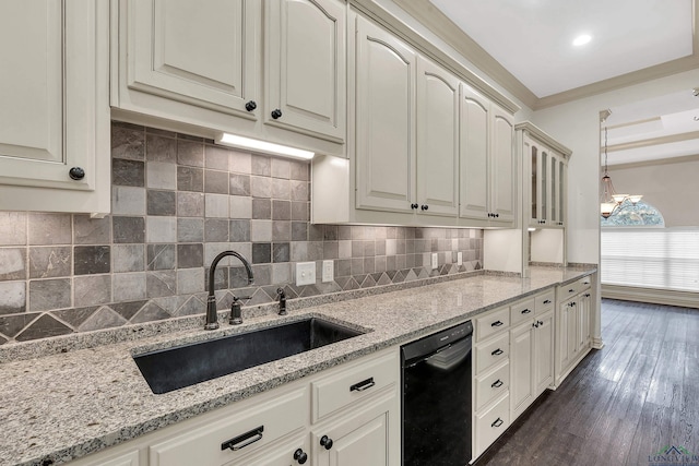 kitchen featuring a sink, dark wood-style floors, ornamental molding, light stone countertops, and dishwasher