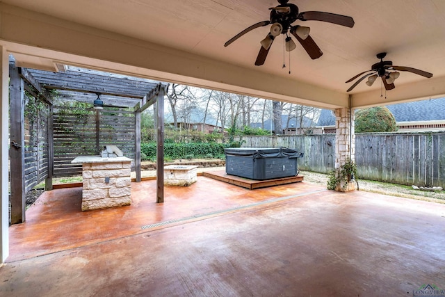 view of patio with fence and a pergola