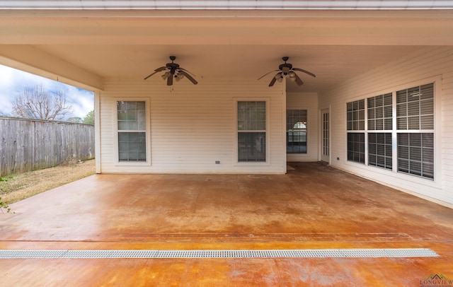 view of patio / terrace featuring fence and ceiling fan