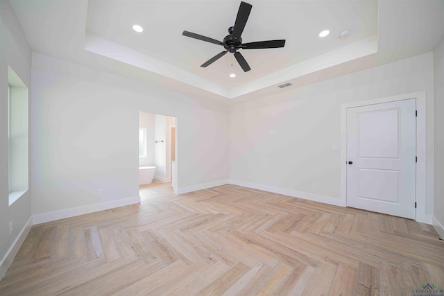 264 Clara Ln, Kilgore, TX 75662 - spare room featuring visible vents, recessed lighting, a ceiling fan, a raised ceiling, and baseboards