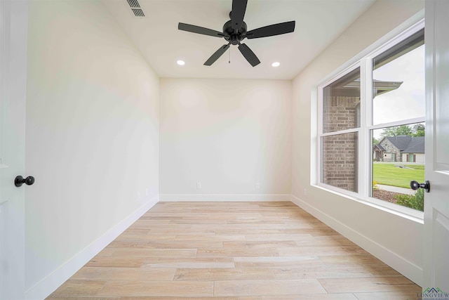 264 Clara Ln, Kilgore, TX 75662 - unfurnished room with baseboards, visible vents, light wood-style flooring, and a ceiling fan
