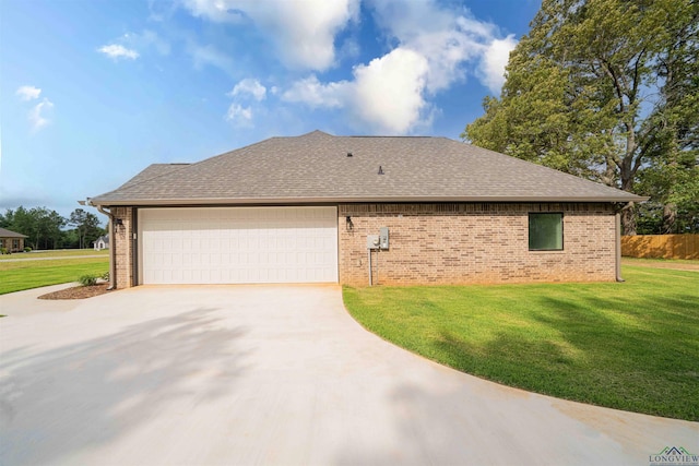 264 Clara Ln, Kilgore, TX 75662 - view of property exterior featuring concrete driveway, brick siding, a garage, and a lawn