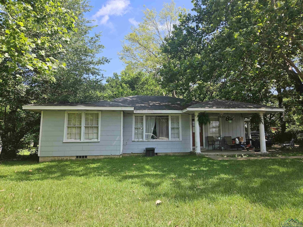 179 Lynch St, Hawkins, TX 75765 - view of front of house with a front lawn and a porch