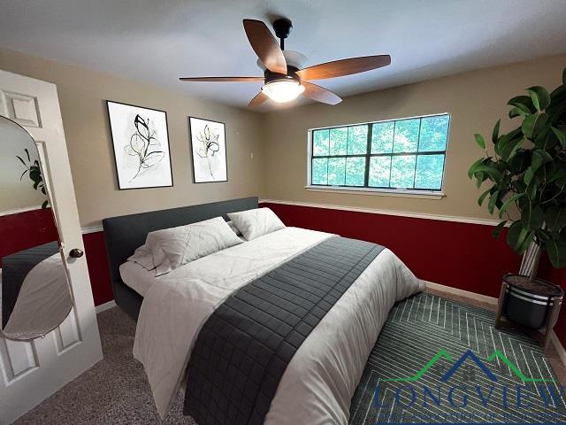 carpeted bedroom with ceiling fan