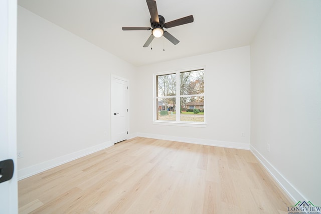 unfurnished room featuring ceiling fan and light wood-type flooring