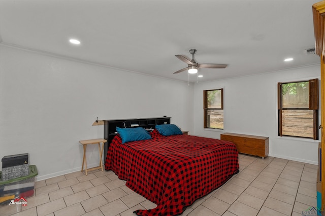 bedroom featuring ceiling fan, crown molding, and light tile patterned flooring