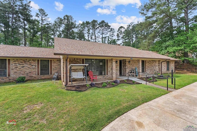 single story home with a front yard