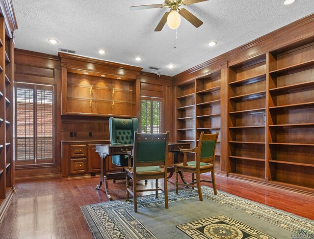 5908 Regents Row, Tyler, TX 75703 - office space featuring a textured ceiling, ceiling fan, built in shelves, dark wood-type flooring, and recessed lighting