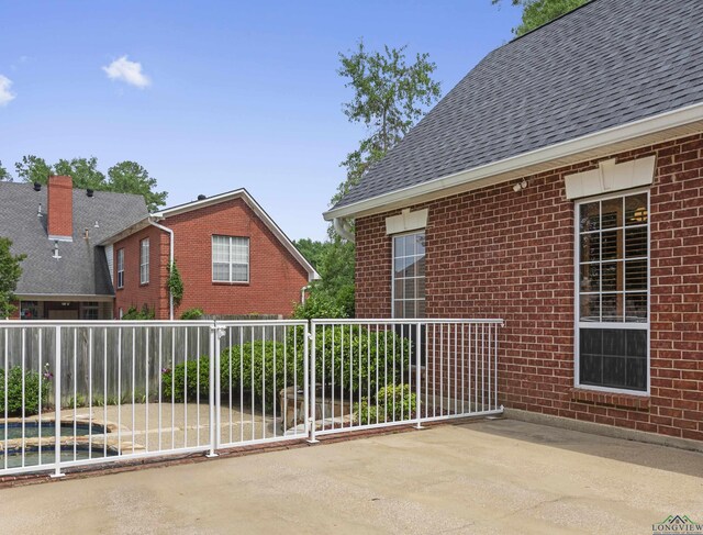 5908 Regents Row, Tyler, TX 75703 - view of patio / terrace featuring a swimming pool