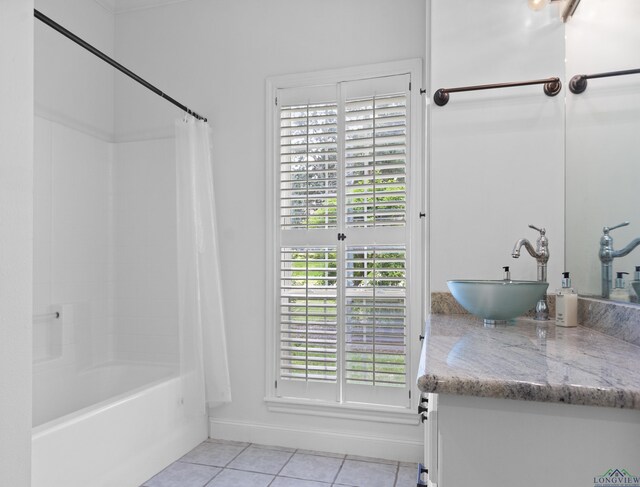 5908 Regents Row, Tyler, TX 75703 - full bath featuring tile patterned flooring, plenty of natural light, shower / bath combo, and vanity