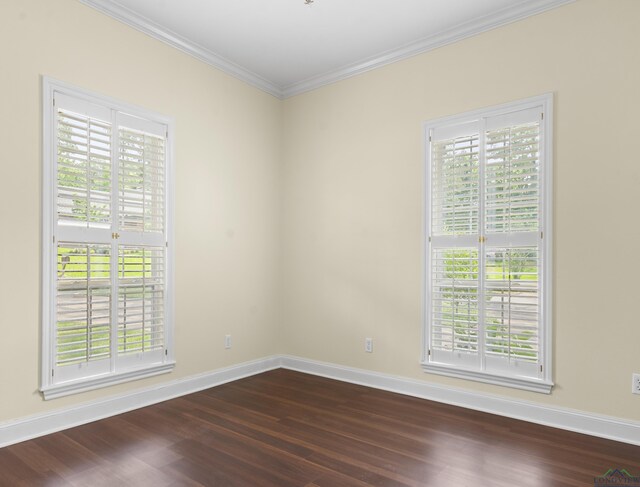 5908 Regents Row, Tyler, TX 75703 - empty room with dark wood finished floors, ornamental molding, and baseboards