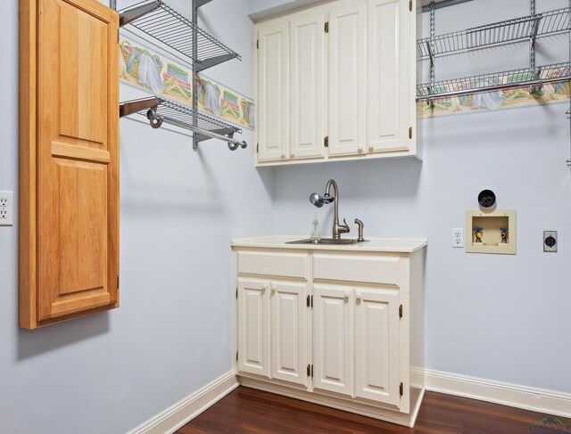 5908 Regents Row, Tyler, TX 75703 - laundry room featuring hookup for an electric dryer, washer hookup, baseboards, and cabinet space