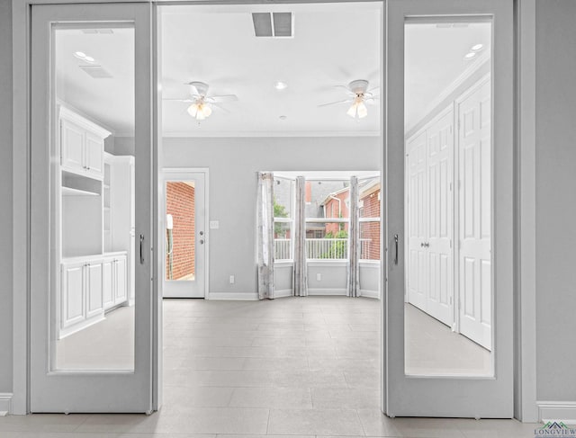 5908 Regents Row, Tyler, TX 75703 - interior space featuring ceiling fan, crown molding, baseboards, and light tile patterned flooring