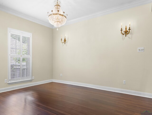 5908 Regents Row, Tyler, TX 75703 - unfurnished room with a chandelier, baseboards, dark wood-type flooring, and crown molding