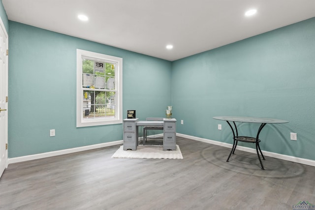home office with wood finished floors, recessed lighting, and baseboards