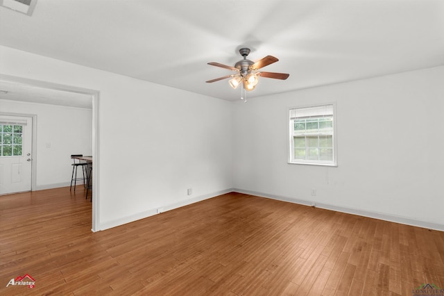 4501 Fm 1650, Gilmer, TX 75645 - spare room with ceiling fan, light wood-style floors, and baseboards