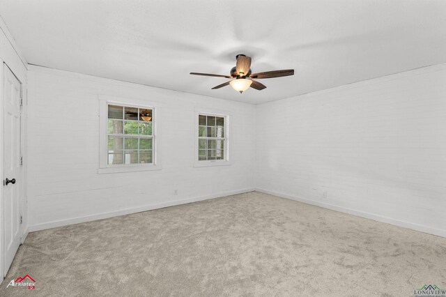4501 Fm 1650, Gilmer, TX 75645 - unfurnished room with carpet floors, ceiling fan, and baseboards