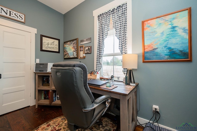 office with dark wood-type flooring