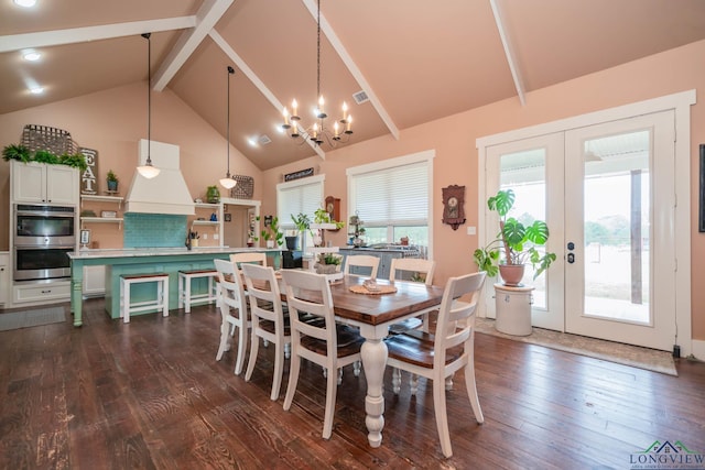 dining room with beamed ceiling, french doors, dark hardwood / wood-style flooring, and a wealth of natural light