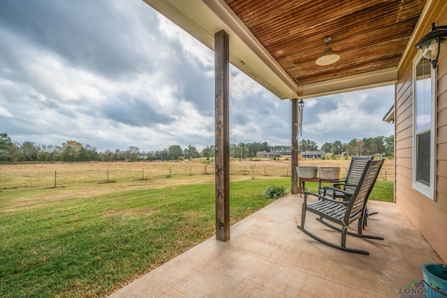 view of patio with a rural view