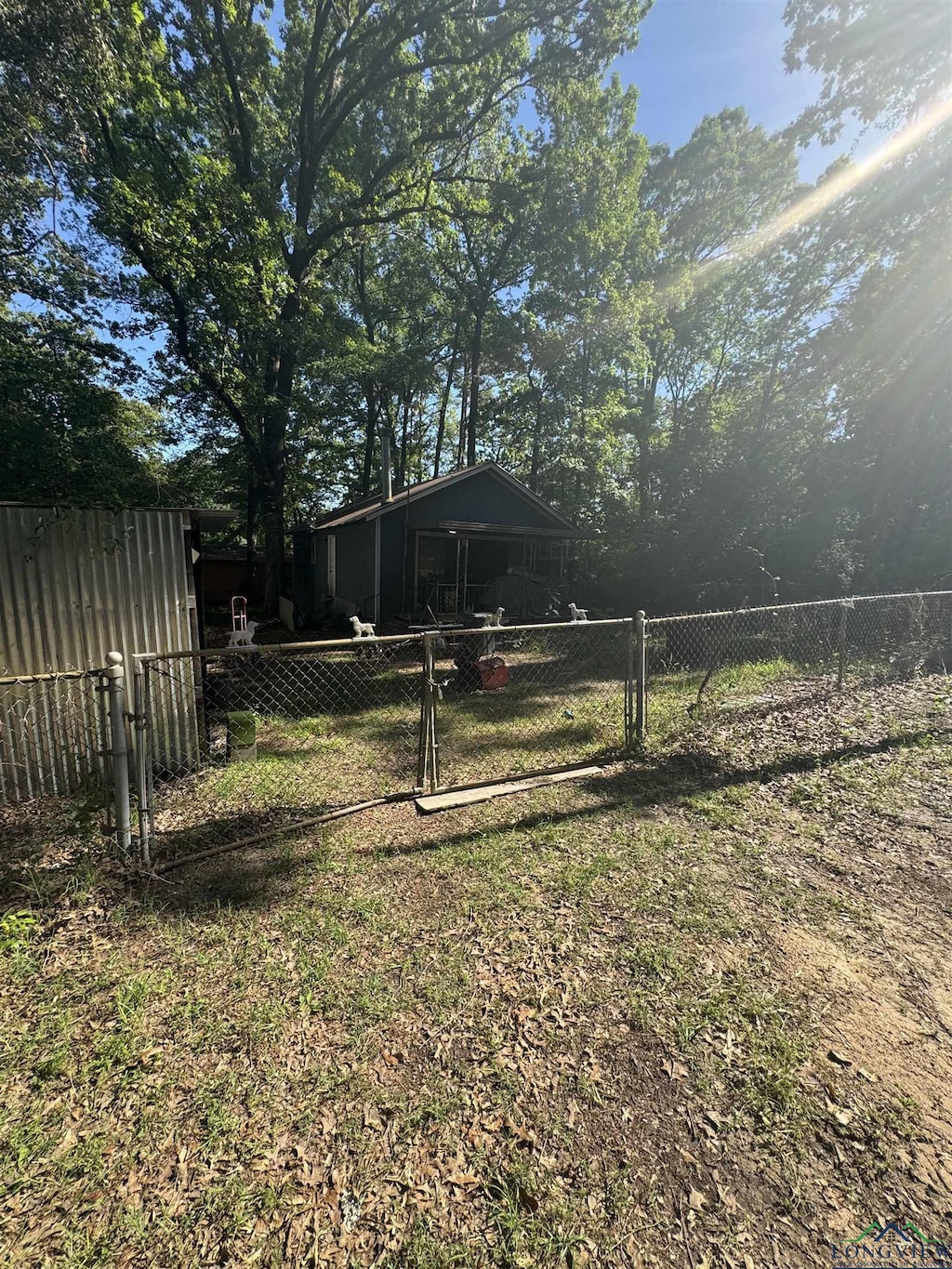 view of yard with a gate and fence