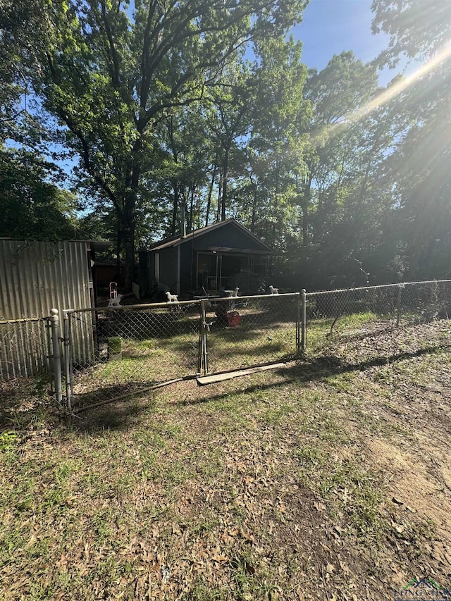 view of yard with a gate and fence