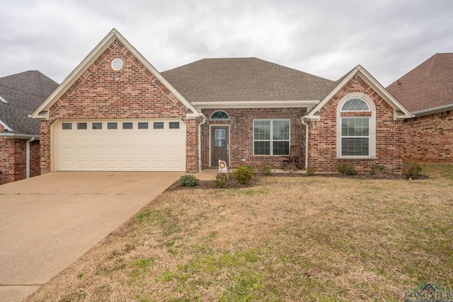 ranch-style house with a garage, concrete driveway, brick siding, and roof with shingles