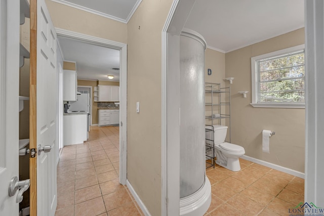 bathroom with tile patterned floors, decorative backsplash, toilet, and walk in shower