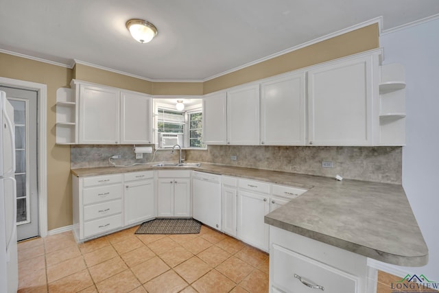 kitchen featuring decorative backsplash, sink, light tile patterned floors, dishwasher, and white cabinets