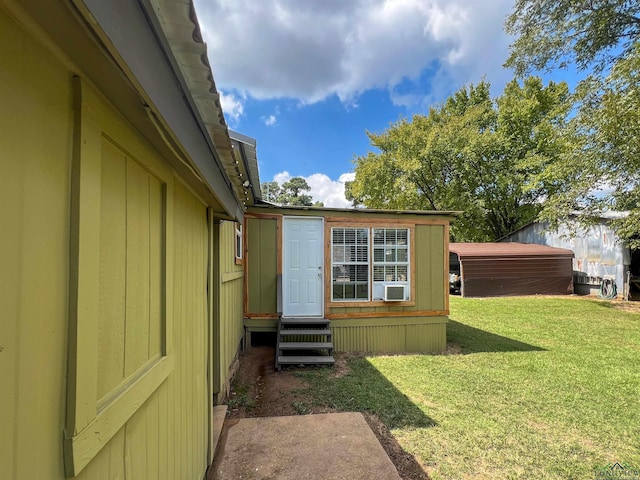 8227 N Kings Hwy, Texarkana, TX 75503 - property entrance featuring a lawn and cooling unit