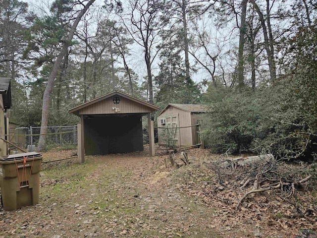 view of yard with a storage unit