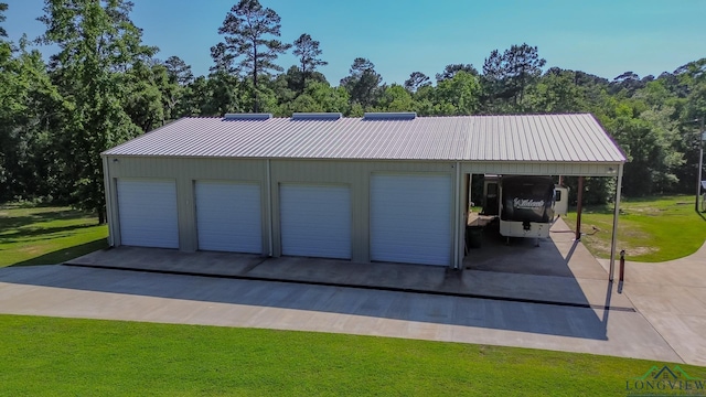 garage with a lawn