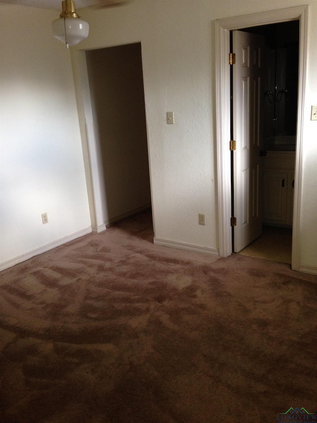 1204 Brandywine Dr, Longview, TX 75601 - spare room featuring carpet floors and baseboards