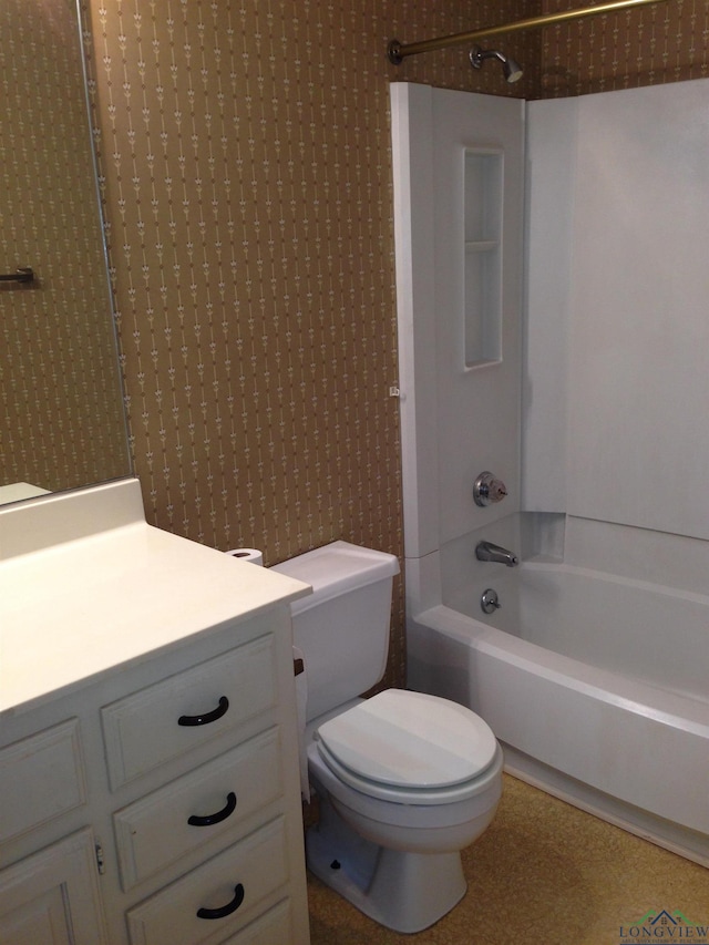 1204 Brandywine Dr, Longview, TX 75601 - bathroom with bathtub / shower combination, vanity, and wallpapered walls