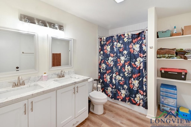 bathroom with vanity, hardwood / wood-style flooring, toilet, and a shower with shower curtain