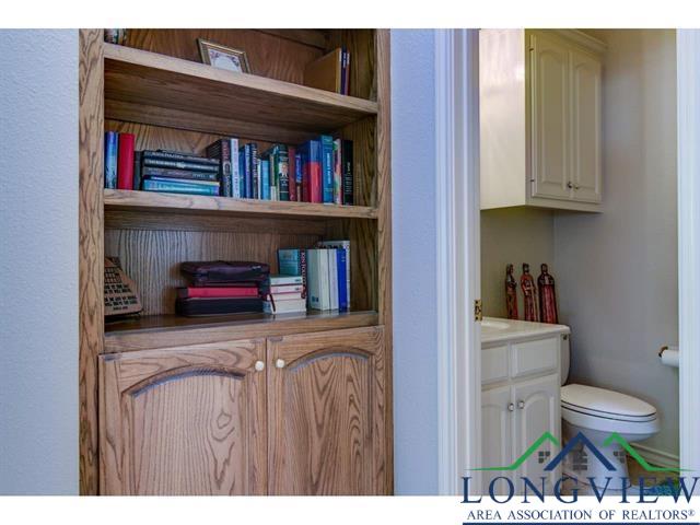 1018 Brown Dr, Texarkana, TX 75501 - half bath featuring toilet and vanity