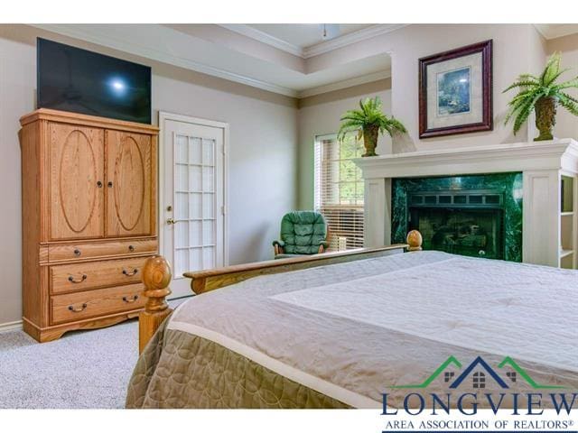 1018 Brown Dr, Texarkana, TX 75501 - carpeted bedroom with crown molding and a premium fireplace