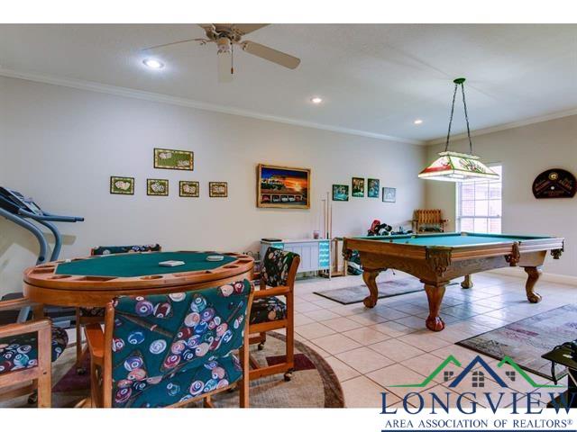 1018 Brown Dr, Texarkana, TX 75501 - playroom with ornamental molding, light tile patterned flooring, a ceiling fan, pool table, and recessed lighting