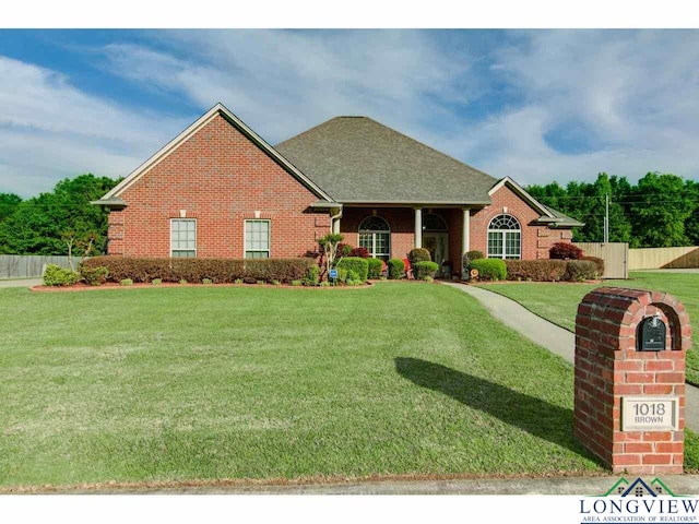 1018 Brown Dr, Texarkana, TX 75501 - view of front facade featuring brick siding and a shingled roof